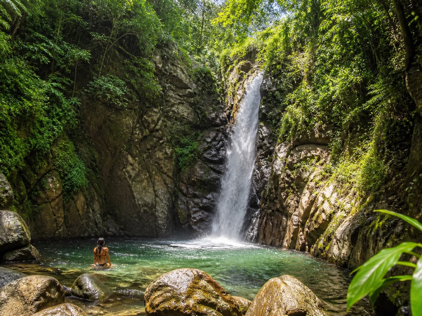Hiking at the Tamanique Waterfalls among trails, nature, and natural pools